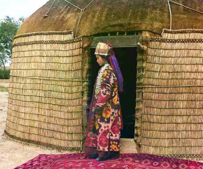 Uzbek woman at the entrance to a yurt in Turkestan 1913