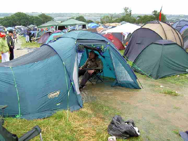 Glastonbury river in field tents