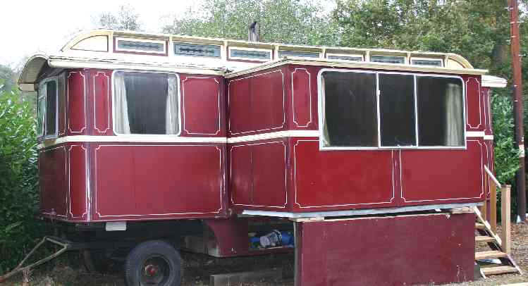 Gypsy caravan 1930s Showman's Wagon side showing pull out centre section