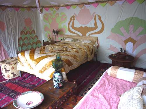 Alice in Wonderland tent interior bedroom furnishings