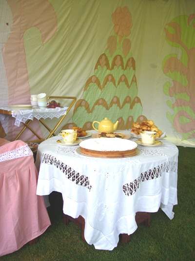 Alice in Wonderland tent interior tea table furnishings