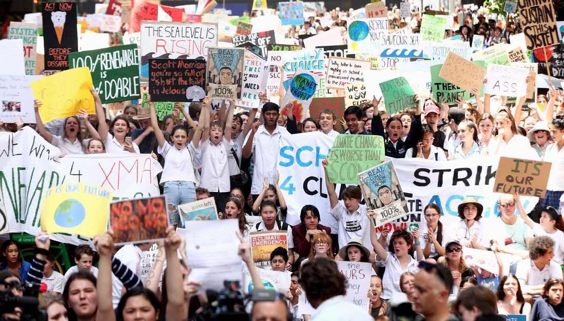 Schollchildren strike outside parliament buildings Canberra Australian climate change protests