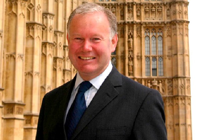 Charles Hendry outside the Houses of Parliament